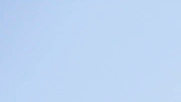 Long Beach police keep a street closed off near a retirement home, seen in background on Monday, June 25, 2018, in Long Beach, Calif. A resident of a retirement home in Southern California opened fire on firefighters responding to a report of an explosion in the building, killing at least one and wounding others, officials said. (AP Photo/Jae C. Hong)