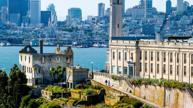 Visitors ascend a walkway at Alcatraz Island on Monday, May 5, 2025, in San Francisco. (AP Photo/Noah Berger)