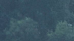 New homes are built next to burned homes at La Viña gated community adjacent to the Chaney Trail Corridor, in an area affected by the Eaton Fire, in Altadena, Calif., on Wednesday, April 23, 2025. (AP Photo/Damian Dovarganes)