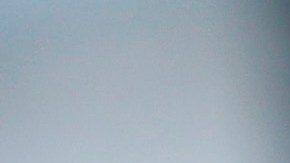 A handcuffed suspect waits inside a police bus during an operation against alleged drug traffickers at the Complexo do Alemao slum in Rio de Janeiro, Brazil, Saturday, Nov. 27, 2010. Soldiers and police crouching behind armored vehicles trained their rifles on dozens of entrances to a sprawling slum Saturday, preparing to invade and try to push drug gangs out an area long considered the most dangerous in Rio de Janeiro, a city set to host the 2016 Olympics. (AP Photo/Felipe Dana)