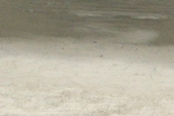 An aerial view shows the devastation from the Palisades Fire on beachfront homes Wednesday, Jan. 15, 2025 in Malibu, Calif. (AP Photo/Jae C. Hong)