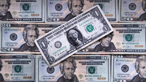 This June 15, 2018, photo shows U.S. currency on a counter in East Derry, N.H. (AP Photo/Charles Krupa)