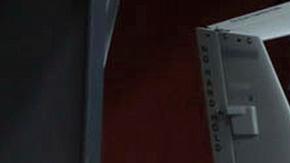 El ministro iraní de Defensa, Aziz Nasirzadeh, habla con el jefe del Estado Mayor de las fuerzas armadas iraníes Abdolrahim Musavi.