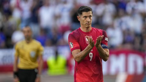 Poland's Robert Lewandowski gestures during a Group D match between the France and Poland at the Euro 2024 soccer tournament in Dortmund, Germany, Tuesday, June 25, 2024. (AP Photo/Darko Vojinovic)