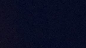 Serbia's Novak Djokovic shows his gold medal after defeating Spain's Carlos Alcaraz in the men's singles tennis final at the Roland Garros stadium during the 2024 Summer Olympics, Sunday, Aug. 4, 2024, in Paris, France. Djokovic has won his first Olympic gold medal by beating Alcaraz 7-6 (3), 7-6 (2) in the 2024 Games men's tennis singles final. (AP Photo/Manu Fernandez)