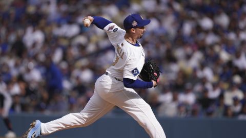 Los Angeles Dodgers pitcher Blake Snell throws to the plate during the first inning of a home-opening baseball game against the Detroit Tigers, Thursday, March 27, 2025, in Los Angeles. (AP Photo/Mark J. Terrill)