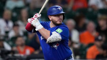 Toronto Blue Jays' Alejandro Kirk bats against the Houston Astros during the second inning of a baseball game Monday, April 21, 2025, in Houston. (AP Photo/Eric Christian Smith)