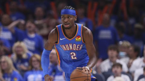 Oklahoma City Thunder guard Shai Gilgeous-Alexander (2) dribbles down the court during the second half of Game 5 of the Western Conference finals of the NBA basketball playoffs against the Minnesota Timberwolves, Wednesday, May 28, 2025, in Oklahoma City. (AP Photo/Nate Billings)