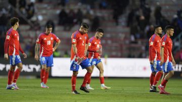 Chile's players react after losing to Bolivia in a qualifying soccer match for the FIFA World Cup 2026 in El Alto, Bolivia, Tuesday, June 10, 2025. (AP Photo/Juan Karita)