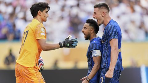Al-Hilal's Yassine Bounou is congratulated by Al-Hilal's Salem Al-Dawsari and Al-Hilal's Sergej Milinkovic-Savic after making a save on a penalty kick during the Club World Cup group H soccer match between Real Madrid and Al Hilal in Miami Gardens, Fla., Wednesday, June 18, 2025. (AP Photo/Rebecca Blackwell)