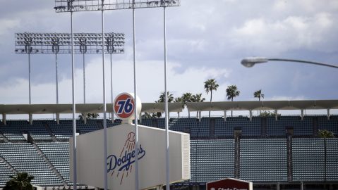 FILE - The exterior of Dodgers Stadium, home of the Los Angeles Dodgers is seen in Los Angeles on March 25, 2020. (AP Photo/Marcio Jose Sanchez, File)