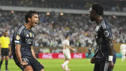 Real Madrid's Vinicius Junior celebrates with teammate Gonzalo Garcia, left, after scoring his team's first goal during the Club World Cup Group H soccer match between Salzburg and Real Madrid in Philadelphia, Thursday, June 26, 2025. (AP Photo/Matt Slocum)