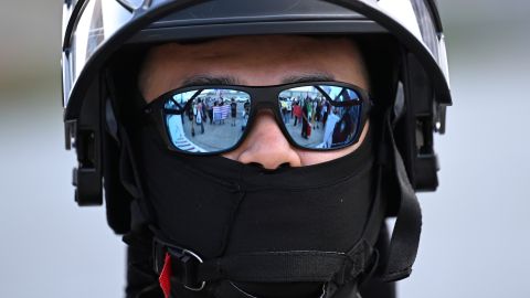 A U.S. Customs and Border Patrol agent looks on during a protest outside the Federal Building on Friday, June 13, 2025, in Los Angeles. (AP Photo/Wally Skalij)