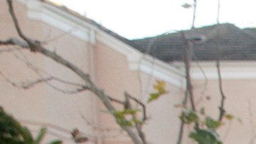 FILE - In this March 3, 2015 file photo, federal agents gather at a nearby parking lot before raiding an upscale apartment complex where authorities say a birth tourism business charged pregnant women $50,000 for lodging, food and transportation, in Irvine, Calif. On Thursday, Jan. 31, 2019, authorities announced they have charged 20 people in an unprecedented crackdown on businesses that helped hundreds of Chinese women travel to the United States to give birth to American citizen children. (AP Photo/Jae C. Hong, File)