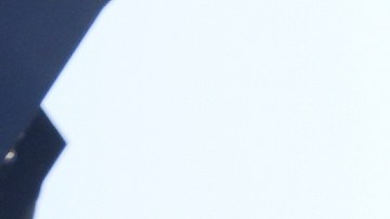 Alejandro Barranco checks his phone as he arrives to check on his father Narciso, who was detained by federal agents, outside the Metropolitan Detention Center on Monday, June 23, 2025, in Los Angeles. (AP Photo/Damian Dovarganes)