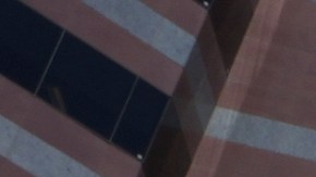 A U.S. Marine stands on guard outside the Metropolitan Detention Center in Los Angeles, on Tuesday, June 16, 2025. (AP Photo/Damian Dovarganes)