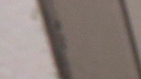 A sleeping detainee is seen through the window of holding cell at a U.S. Customs and Border Protection processing facility, Wednesday, June 18, 2014, in Brownsville,Texas. CPB provided media tours Wednesday of two locations in Brownsville and Nogales, Ariz. that have been central to processing the more than 47,000 unaccompanied children who have entered the country illegally since Oct. 1. (AP Photo/Eric Gay, Pool)