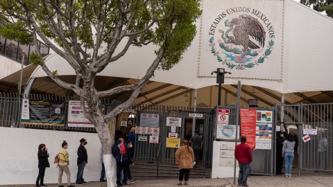 People line outside the Mexican Consulate in Los Angeles to be vaccinated in Los Angeles Saturday, May 8, 2021. CHIRLA, the Coalition for Humane Immigrant Rights, and the Mexican Consulate in Los Angeles are holding two days of COVID-19 vaccination clinic this week, where members of the immigrant community can get their vaccine without an appointment. (AP Photo/Damian Dovarganes)