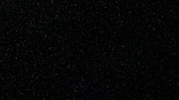 President Donald Trump speaks to reporters in the rain after arriving on Air Force One at Joint Base Andrews, Md., Friday, May 30, 2025. (AP Photo/Julia Demaree Nikhinson)