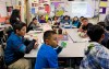 In this Wednesday, April 8, 2015 photo, students are served breakfast at the Stanley Mosk Elementary School in Los Angeles. In this Los Angeles Unified School District program, and in other major urban school districts, breakfast is increasingly being served inside the classroom. The number of breakfasts served in the nations schools has doubled in the last two decades, a surge driven largely by a change in how districts deliver the food. Instead of providing low-income students free or reduced-price meals in the cafeteria, theyre increasingly serving all children in the classroom. (AP Photo/Nick Ut)