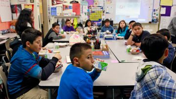 In this Wednesday, April 8, 2015 photo, students are served breakfast at the Stanley Mosk Elementary School in Los Angeles. In this Los Angeles Unified School District program, and in other major urban school districts, breakfast is increasingly being served inside the classroom. The number of breakfasts served in the nations schools has doubled in the last two decades, a surge driven largely by a change in how districts deliver the food. Instead of providing low-income students free or reduced-price meals in the cafeteria, theyre increasingly serving all children in the classroom. (AP Photo/Nick Ut)