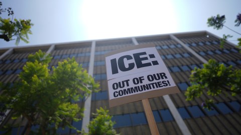 A protester's placard stands near the metropolitan detention center Monday, June 9, 2025, in downtown Los Angeles. (AP Photo/Eric Thayer)