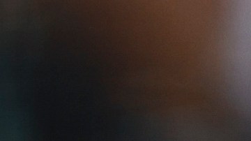 Music artist Nezza sings the national anthem prior to a baseball game between the Los Angeles Dodgers and the San Francisco Giants in Los Angeles, Saturday, June 14, 2025. (AP Photo/Jessie Alcheh)