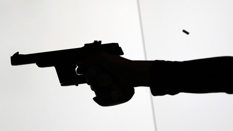 An athlete competes during the women's 25 meter pistol qualification precision competition at Olympic Shooting Center at the 2016 Summer Olympics in Rio de Janeiro, Brazil, Tuesday, Aug. 9, 2016. (AP Photo/Eugene Hoshiko)