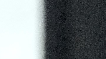 A flowers vendor walks along an empty street in Beverly Hills, Calif. on Saturday, May 9, 2020. Los Angeles County permitted the reopening of trails and golf courses but with social distancing restrictions. Weekend shoppers can visit bookstores, as well as stores for jewelry, toys, clothing, shoes, home supplies and furnishing, sporting goods, antiques and music. (AP Photo/Richard Vogel)