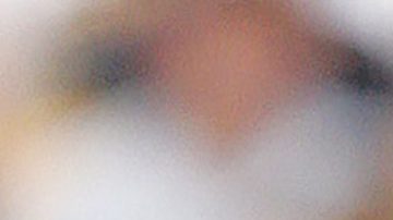 FILE - Pittsburgh Steelers quarterback Ben Roethlisberger rolls out of the pocket during first quarter NFL football action against the New England Patriots in Pittsburgh, Sept. 25, 2005. Roethlisberger's NFL career is over. The longtime Pittsburgh Steelers quarterback announced his retirement on Thursday, Jan. 27, 2022, saying it was “time to clean out my locker, hang up my cleats” after 18 years, two Super Bowls, countless team records and a spot in the Hall of Fame all but secure. (AP Photo/Gene J. Puskar, File)