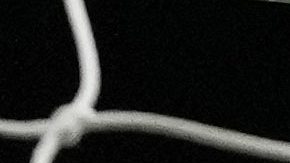 The ball hits the back of the net as West Ham's Tomas Soucek, left, celebrates after scoring the opening goal during the English Premier League soccer match between Arsenal and West Ham at Emirates stadium in London, England, Thursday, Dec. 28, 2023. (AP Photo/Alastair Grant)