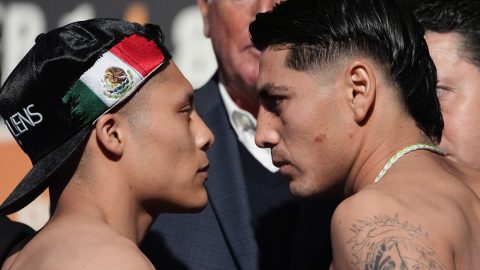 Isaac Cruz, left, and Angel Fierro face off during a ceremonial weigh-in for their super lightweight fight, Friday, Jan. 31, 2025, in Las Vegas. (AP Photo/John Locher)