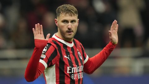 AC Milan's Santiago Gimenez celebrates after scoring his side's first goal during Champions League, playoff second leg soccer match between AC Milan and Feyenoord, at the San Siro stadium in Milan, Italy, Tuesday, Feb.18, 2025. (AP Photo/Luca Bruno)