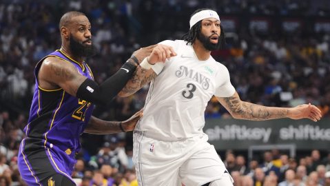 Los Angeles Lakers' LeBron James, left, works against Dallas Mavericks' Anthony Davis (3) in the first half of an NBA basketball game in Dallas, Wednesday, April 9, 2025. (AP Photo/LM Otero)