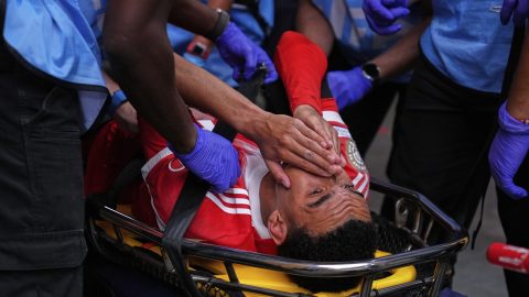 Bayern Munich's Jamal Musiala is taken off the field after an injury during the Club World Cup quarterfinal soccer match between PSG and Bayern Munich in Atlanta, Saturday, July 5, 2025. (AP Photo/Brynn Anderson)