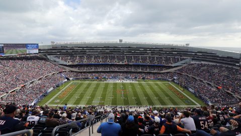 FILE - Fans watch an NFL football game between the Chicago Bears and the Detroit Lions, at Soldier Field in Chicago, Oct. 2, 2016. (AP Photo/Kiichiro Sato, File)