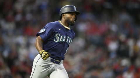 Seattle Mariners Randy Arozarena reacts after hitting a home run during the fifth inning of a baseball game against the Los Angeles Angels, Thursday, July 24, 2025, in Anaheim, Calif. (AP Photo/William Liang)