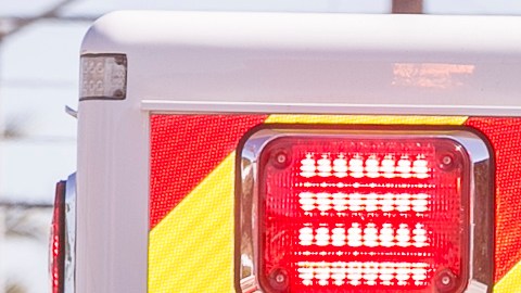An unidentified Los Angeles firefighter is checked inside an ambulance after containing a fire at the Animo South Los Angeles Charter High School in Los Angeles, Tuesday, July 22, 2014. The building was presumed empty, although crews had been doing routine maintenance work over the summer break to ready it for the school year that begins Aug. 12, according to Gabriel Sanchez, a spokesman for Green Dot schools, which runs the charter school under Los Angeles Unified School District control. Three firefighters suffered minor injuries, but all were treated at the scene. (AP Photo)