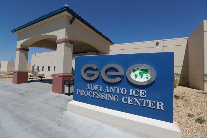 In this Wednesday, Aug. 28, 2019, photo shows the exterior of the Adelanto ICE Processing Center in Adelanto, Calif. The facility is a privately operated immigration detention center run by the GEO Group, which can house up to about 1900 total immigrant detainees, both male and female.(AP Photo/Chris Carlson)