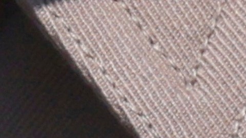 Los Angeles County Sheriff Robert Luna wears a band over his badge after three members of the department were killed in an explosion at a training facility on Friday, July 18, 2025, in Los Angeles. (AP Photo/Etienne Laurent)