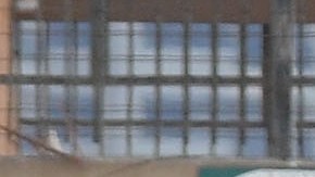 U.S. Customs and Border Protection agents stand in southbound lanes next to a construction site where a scaffolding collapsed at the San Ysidro Port of Entry in San Diego Wednesday, Sept. 14, 2011. Three people have been taken to hospitals after construction scaffolding collapsed on cars at the nation's busiest border crossing connecting San Diego and Tijuana, Mexico. (AP Photo/Denis Poroy)
