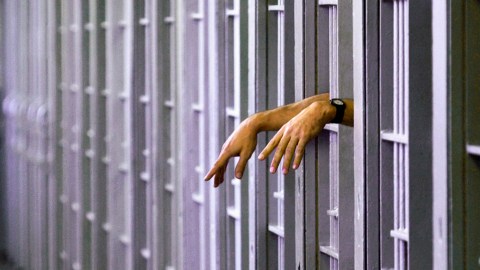 FILE - This Jan. 21, 2003 file photo shows an unidentified death row inmate in his cell in the North Condemned Unit at Pontiac Correctional Institution in Pontiac, Ill. On Friday, July 1, 2011, a ban that Gov. Pat Quinn signed into law in March took effect, shutting down Illinois' death row. It's a quiet last chapter to the story of capital punishment in Illinois, which captured the attention of the world in 2000 when then-Gov. George Ryan imposed a moratorium. Ryan cleared death row entirely three years later. Illinois has executed 12 men since 1977 when the death penalty was reinstated, the last one in 1999. (AP Photo/Seth Perlman, File)