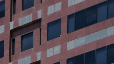 U.S. National Guard stand protect buildings Tuesday, June 10, 2025, in Los Angeles. (AP Photo Damian Dovarganes)