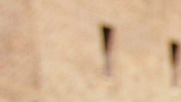 A girl buys flavored ice from a street vendor in the East Village neighborhood of Manhattan, Saturday, July 29, 2006 in New York. After back-to-back blackouts in Queens and Staten Island the city was braced for another hot weekend and further stress on the power grid. (AP Photo/Dima Gavrysh)