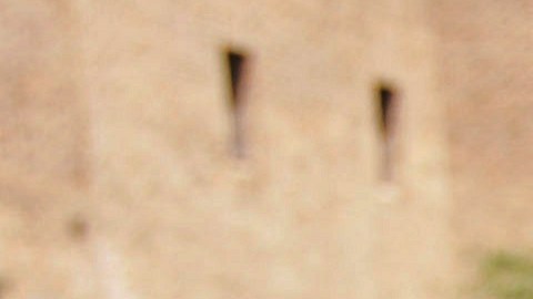 A girl buys flavored ice from a street vendor in the East Village neighborhood of Manhattan, Saturday, July 29, 2006 in New York. After back-to-back blackouts in Queens and Staten Island the city was braced for another hot weekend and further stress on the power grid. (AP Photo/Dima Gavrysh)