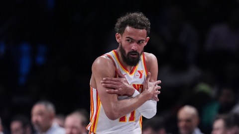 Atlanta Hawks' Trae Young (11) gestures after making a three-point shot during the second half of an NBA basketball game against the Brooklyn Nets Thursday, April 10, 2025, in New York. (AP Photo/Frank Franklin II)