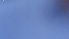 Serbia's Novak Djokovic tries to keep cool during a change of ends break against Italy's Jannik Sinner in a men's singles semifinal at the Wimbledon Tennis Championships in London, Friday, July 11, 2025. (AP Photo/Kin Cheung)