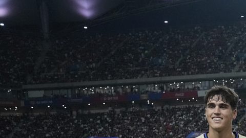Los jugadores del FC Barcelona posan durante un partido de su gira asiática.