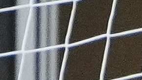 Cruz Azul goalkeeper Kevin Mier, left, makes a point-blank save against Seattle Sounders forward Danny Musovski (19) during the first half of a Leagues Cup soccer match soccer match Thursday, July 31, 2025, in Seattle. (AP Photo/Lindsey Wasson)