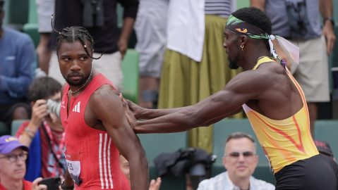 Kenny Bednarek pushes Noah Lyles after the men's 200-meter finals during the U.S. Championships athletics meet in Eugene, Ore.,Sunday, Aug. 3, 2025. (AP Photo/Ashley Landis)